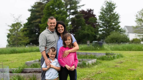 Patient and family outside in yard